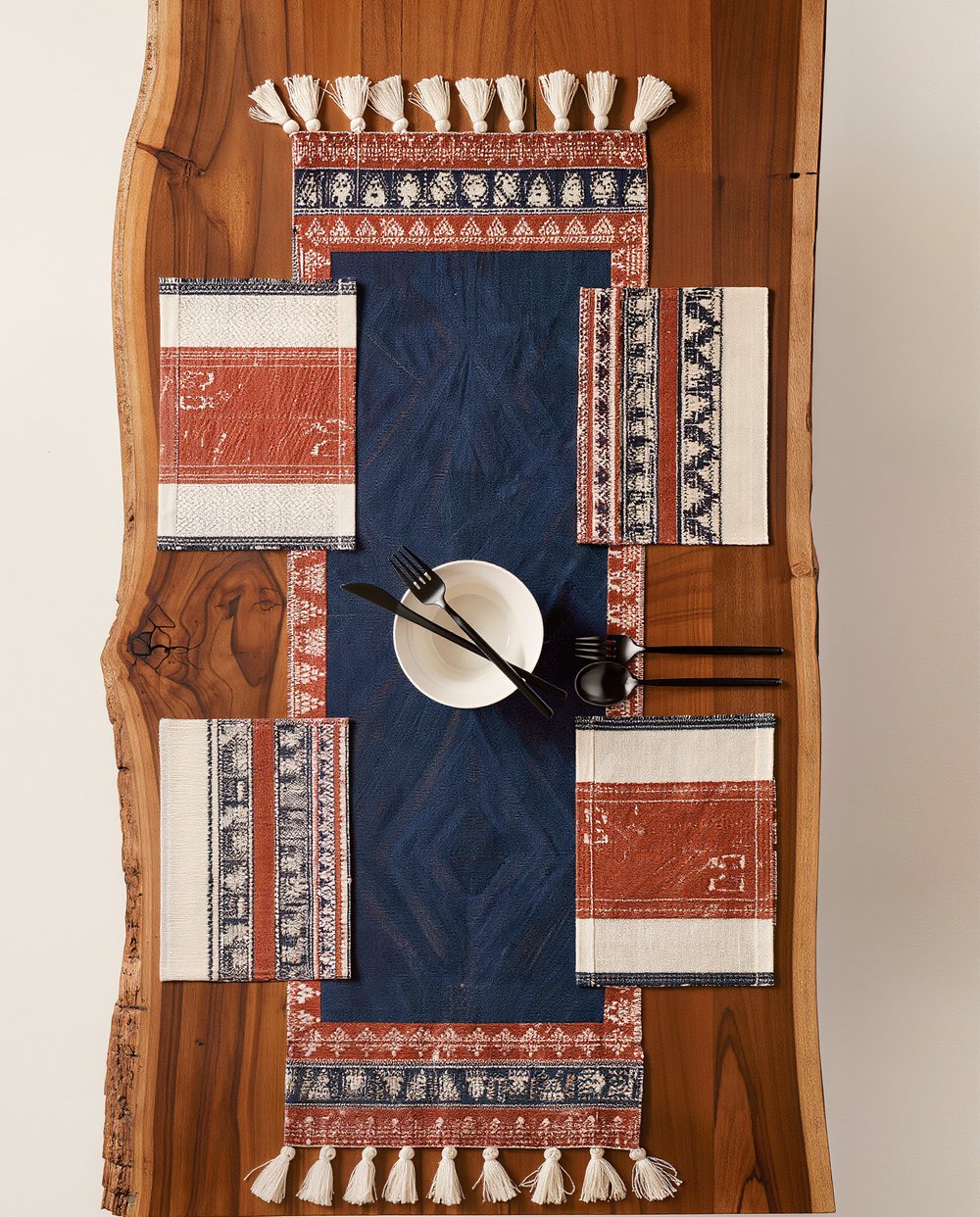 Samal Textile table runner and matching placemat set on a wood table